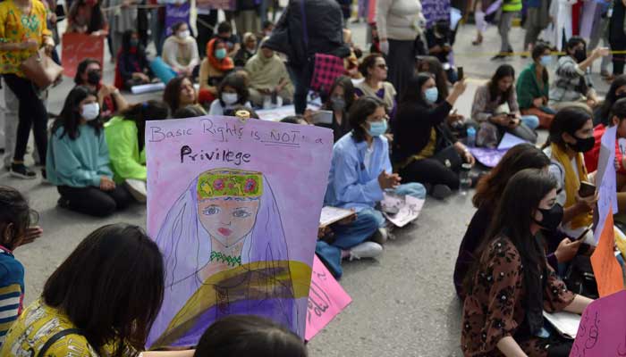 Aurat March protesters hold placards as they gather to mark the International Womens Day in Islamabad. — AFP/File