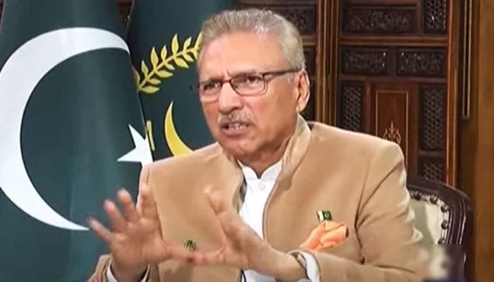 President Arif Alvi speaks during an interview with Geo News Hamid Mir in Islamabad, on March 29, 2023, in this still taken from a video. — YouTube/GeoNews