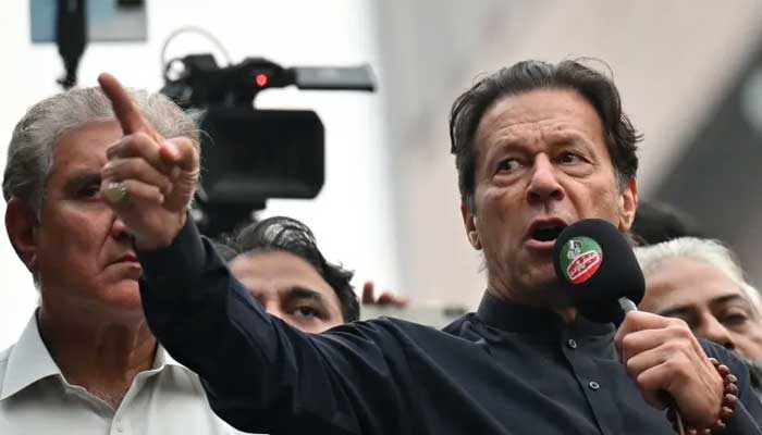 PTI Chairman Imran Khan addressing his partys long march last year. — AFP/File