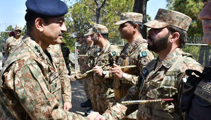 Chief of Army Staff General Asim Munir meets officers and troops on the forward positions along the Line of Control on April 6. — ISPR