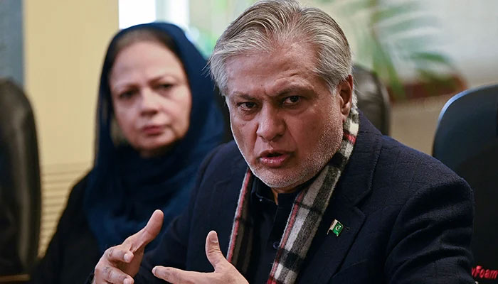 Finance Minister Ishaq Dar speaks during a press conference in Islamabad on February 10, 2023. — AFP