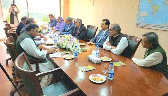 The PTI and PDM leaders holding negotiations for elections — Twitter/file