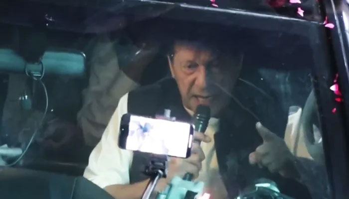 PTI Chairman Imran Khan addresses his supporters during a rally in Lahore, on May 6, 2022, in this still taken from a video. — Twitter/@PTIOfficial