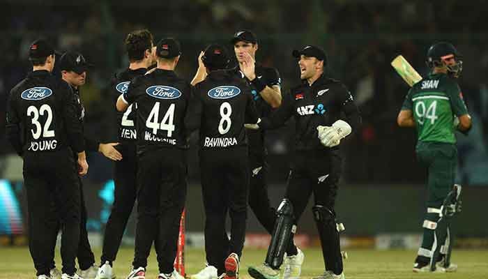 New Zealand´s players celebrate the dismissal of Pakistan´s Shan Masood (R) during the fifth and final one-day international (ODI) cricket match between Pakistan and New Zealand at the National Stadium in Karachi on May 7, 2023. — AFP