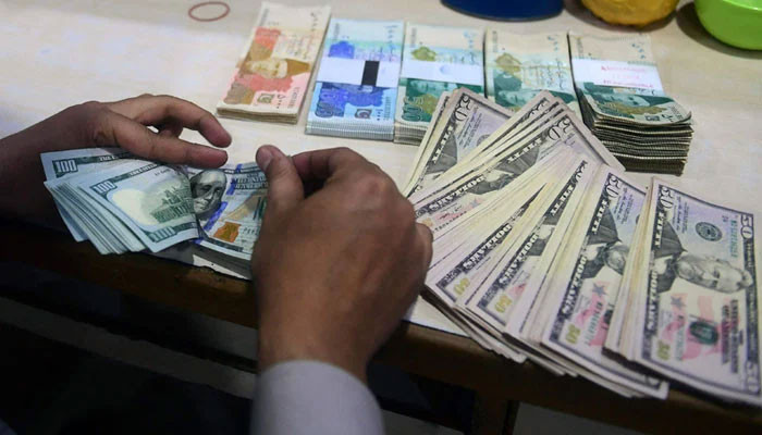 Rupee drops to new low of 298.93 per dollar in interbank market - Vimarsana News