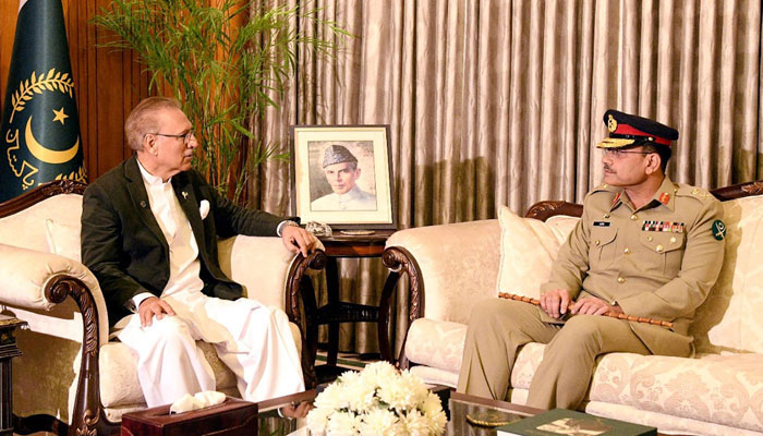 President Arif Alvi meets COAS General Asim Munir at the Presidents House in Islamabad. — AFP/File