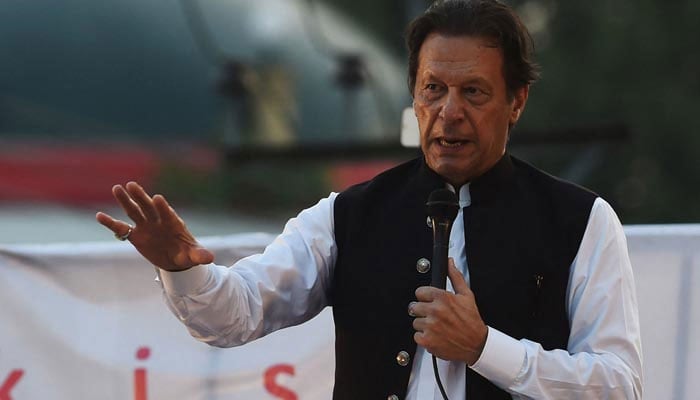 Pakistan Tehreek-e-Insaf (PTI) Chairman and former prime minister Imran Khan addressing a public gathering. — AFP
