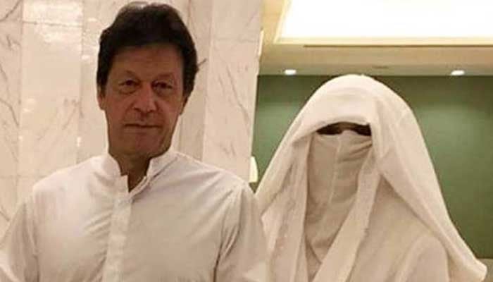PTI Chairman Imran Khan and his wife Bushra Bibi. — Twitter/File
