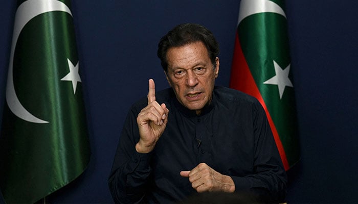 Former Pakistan´s Prime Minister Imran Khan gestures as he speaks during an interview with AFP at his residence in Lahore on May 18, 2023. —AFP