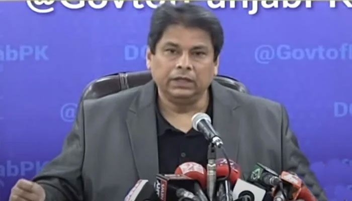 Caretaker Information Minister Aamir Mir addressing a press conference. — Screengrab/Geo News