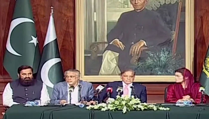 Prime Minister Shehbaz Sharif, Finance Minister Ishaq Dar addressing the media after overseeing the signing of the SLA with IMF. — Screengrab/PTV/YouTube