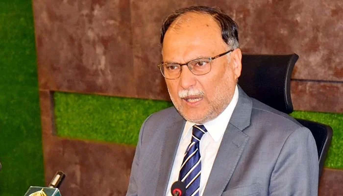 Federal Minister for Planning and Development Professor Ahsan Iqbal addresses a press conference in Islamabad on August 30, 2022. — PPI