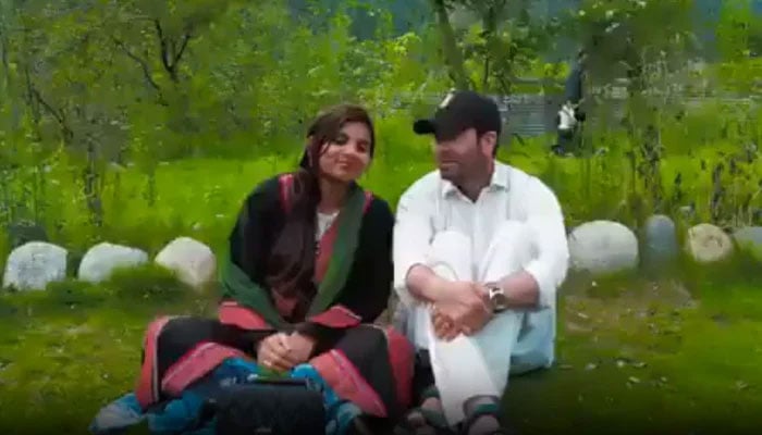 Indias Anju and her Pakistani husband Nasrullah are seen in this screengrab taken from a Facebook video.