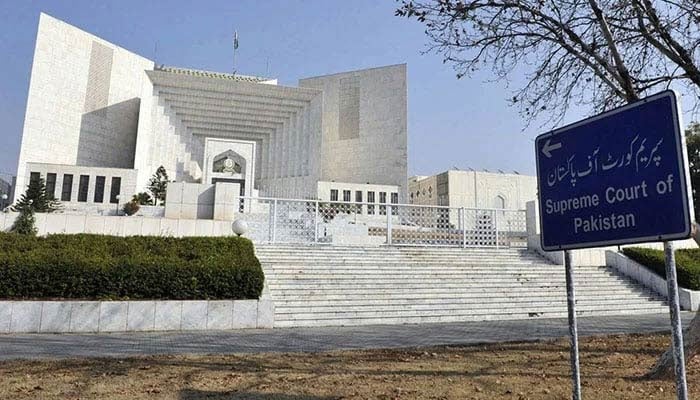 A sign board pointing towards the Supreme Court building. — SC website