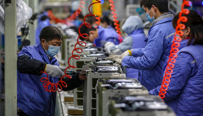 An air conditioner production line at a factory in Wuhan, China.  AFP-JIJI