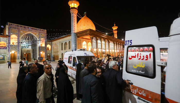 Emergency personnel transport the injured following a shooting attack at Iran´s Shah Cheragh mausoleum in the Fars province capital Shiraz, on August 13, 2023.—AFP