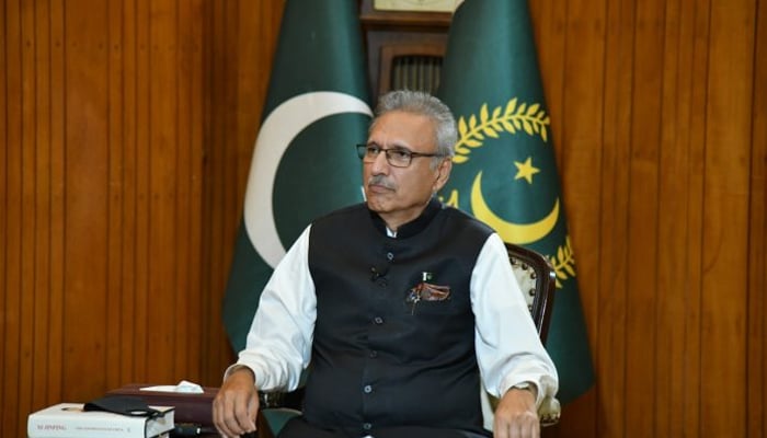 President Dr Arif Alvi can be seen in this picture sitting. — APP/File