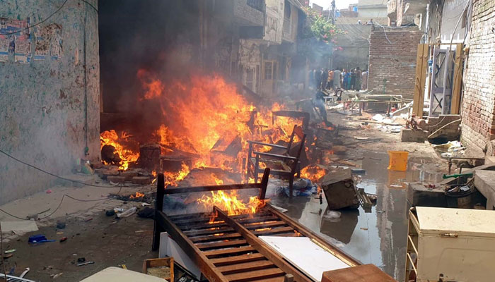 Mob enraged over blasphemy charges set on fire several churches and a number of houses belonging to Christians in Jaranwala tehsil of Faisalabad on Wednesday, August 16, 2023. PPI