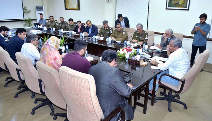 Caretaker Chief Minister Punjab Mohsin Naqvi is chairing a meeting with the district administration in the commissioners office during his visit to Faisalabad city. — APP/File