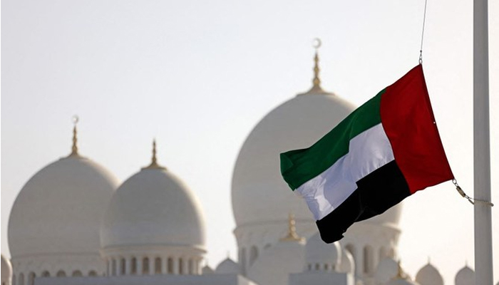 The UAE’s flag flies outside the Sheikh Zayed Grand Mosque in Abu Dhabi. — AFP/File
