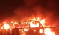 Collision with pickup loaded with diesel: 18 killed as passenger bus catches fire near Pindi Bhattian