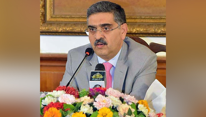 Caretaker Prime Minister Anwaar-ul-Haq Kakar while interacting with business community on August 23, 2023. — APP