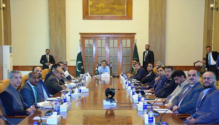 Caretaker Prime Minister Anwaar-ul-Haq Kakar chairs a meeting to review the security situation in the country, on August 26, 2023. — APP