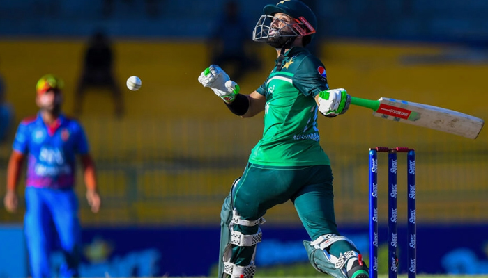 Pakistans Muhammad Rizwan can be seen taking a shot in a match against Afghanistan. — AFP