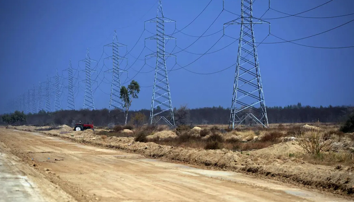 Power transmission poles can be seen in this picture. — AFP/File