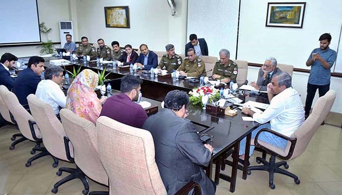 Caretaker Chief Minister Punjab Mohsin Naqvi while chairing a meeting in to Faisalabad city. — APP/File