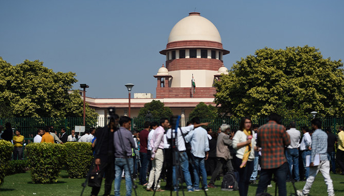Members of the media gather at the Supreme Court in New Delhi. — AFP/File