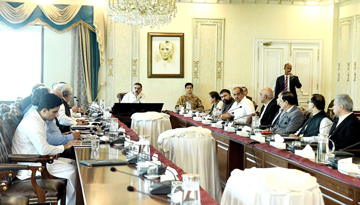 Caretaker Prime Minster Anwaar ul Haq Kakar chairing an emergency meeting regarding electricity bills at the Prime Minister’s House on August 27, 2023. — NNI