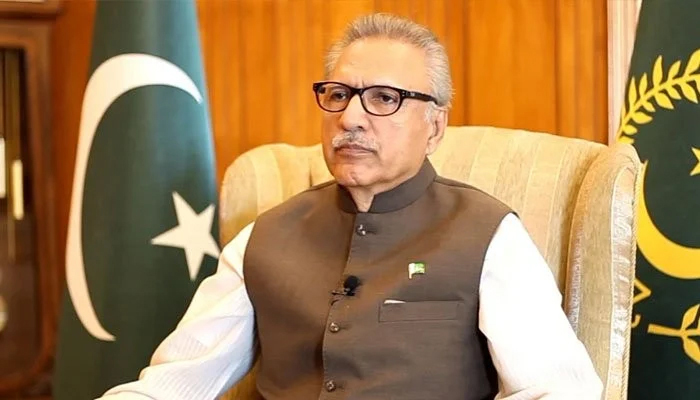 President of Pakistan Dr Arif Alvi while sitting in his office. — PID/File