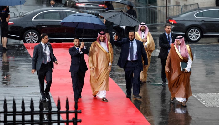 Saudi Crown Prince Mohammed bin Salman (C) arrives at the Palais Brogniart to attend the New Global Financial Pact Summit in Paris on June 22, 2023. — AFP