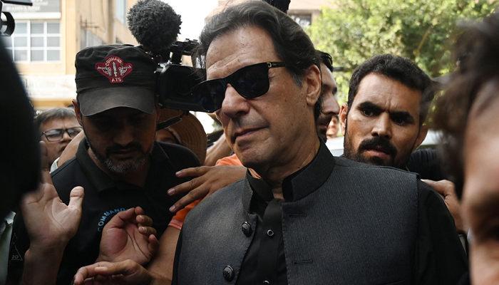 Pakistan Tehreek-e-Insaf (PTI) Chairman and former Primer Minister Imran Khan while appearing in a court. — AFP/File