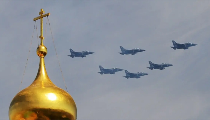 Yakovlev Yak-130 Mitten subsonic two-seat advanced jet trainers of Wings of Tavrida fly over Red Square during the Victory Day military parade in Moscow. — AFP/File