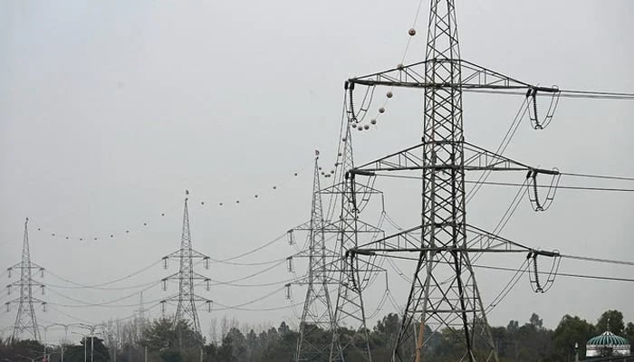A general view of the high voltage lines during a nationwide power outage in Rawalpindi on January 23, 2023. — AFP