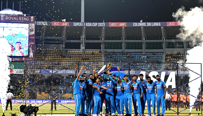 Indias players celebrate with the trophy after winning the Asia Cup 2023 one-day international (ODI) final cricket match between India and Sri Lanka at the R. Premadasa Stadium in Colombo on September 17, 2023. — AFP