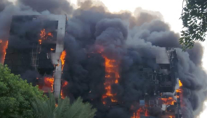 This picture taken on September 17, 2023, shows a raging fire at the Greater Nile Petroleum Oil Company Tower in Khartoum. — AFP