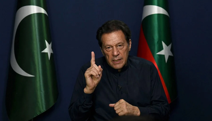 Former Pakistans Prime Minister Imran Khan gestures as he speaks during an interview with AFP at his residence in Lahore. — AFP/File
