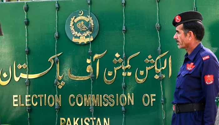 A security personnel stands guard at the headquarters of the Election Commission of Pakistan in Islamabad. — AFP/File