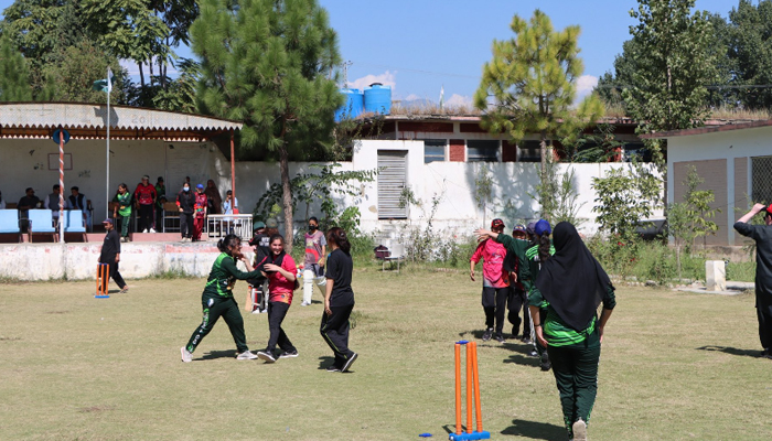 Girl players can be seen playing in their first-ever cricket match held in the Kabal tehsil on October 3, 2023. — X/@DC_Swat