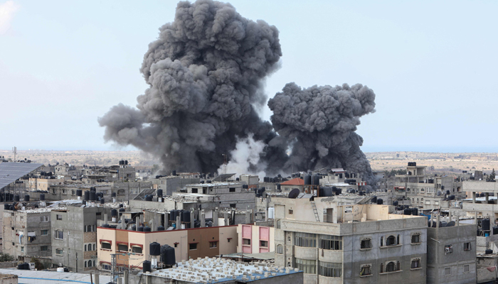 Smoke billows during an Israeli air strike in Rafah in the southern Gaza Strip on October 12, 2023. — AFP