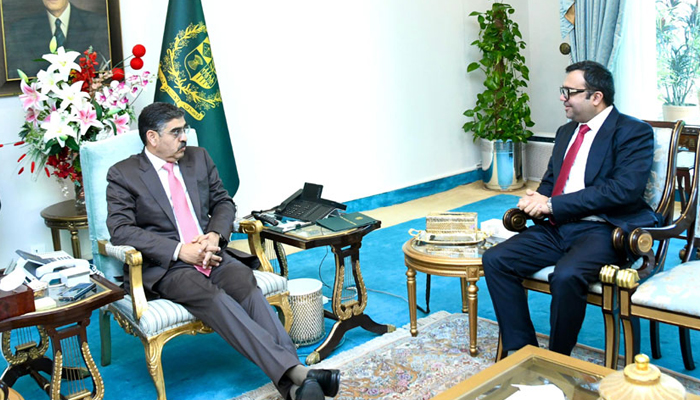 Pakistans Ambassador-designate to Morocco Sami Malik (right) called on Caretaker Prime Minister Anwaar-ul-Haq Kakar in Islamabad. — Radio Pakistan/File