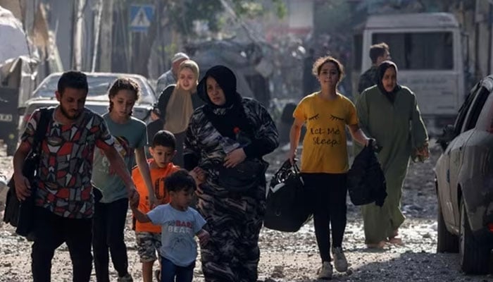 Palestinians evacuate a neighbourhood in Gaza City. — AFP/File