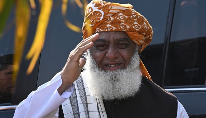 Pakistan´s opposition leader Fazlur Rehman gestures as he arrives to attend a press conference in Islamabad on March 30, 2022. — AFP