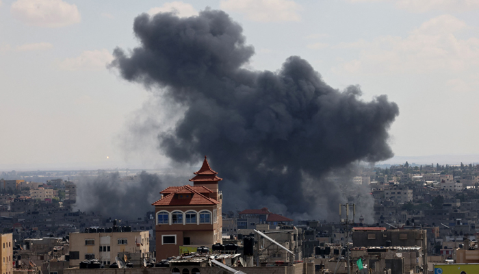 Smoke billows after an Israeli airstrike at the Rafah refugee camp, in the southern Gaza Strip on October 17, 2023. — AFP