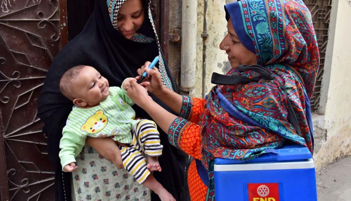 A polio worker during a polio drive. — UNICEF/File