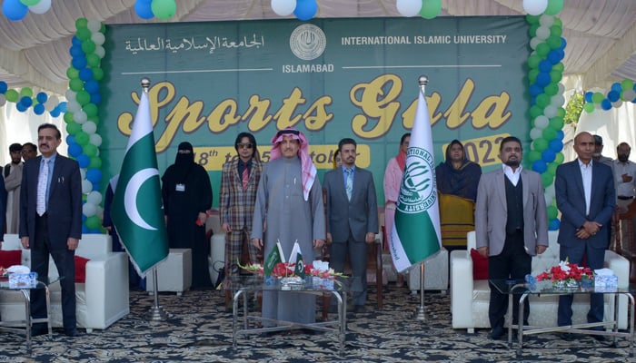 Professor Dr. Hathal Homoud Alotaibi (C) during the Sports Gala 2023 of International Islamic University (IIU) in Islamabad on October 18, 2023. — Facebook/International Islamic University, Islamabad (IIU)