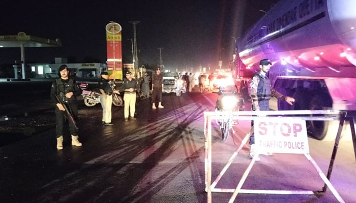 Peshawar Police officials during a checkpoint in the city on October 9, 2023. — X/@PeshawarCCPO